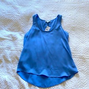 Jcrew sleeveless top in bright peri. Sold out! New with tags and never worn.